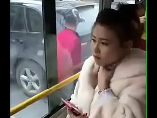 Chinese girl kissed. In bus .